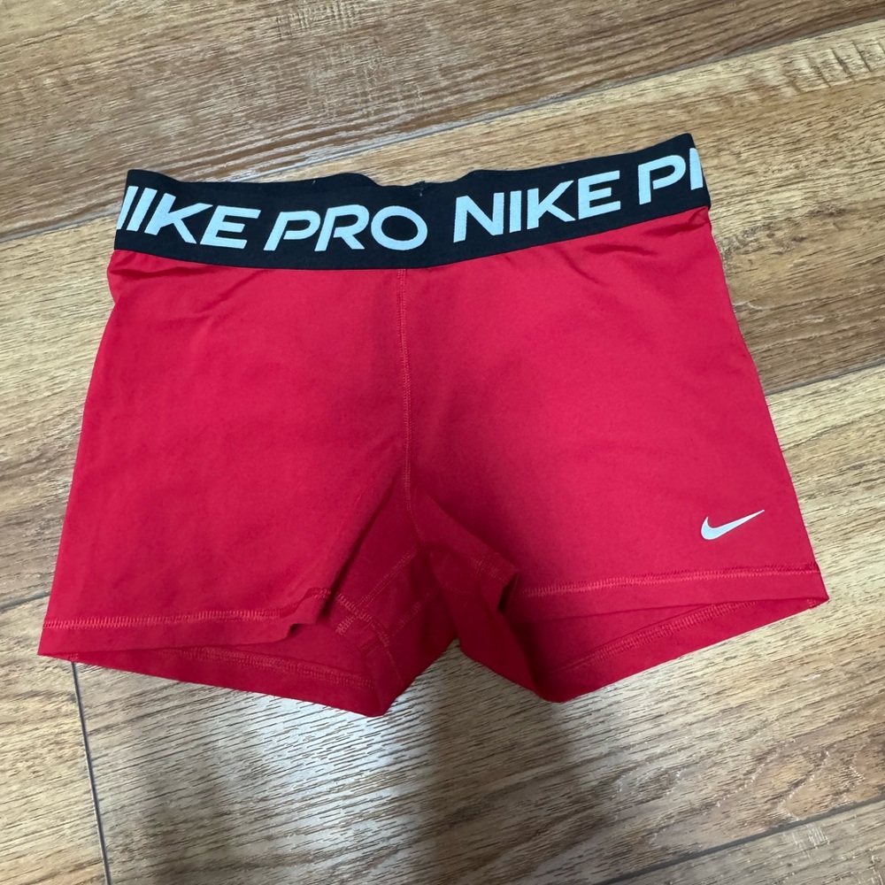 Nike Pro Dri-FIT Red Shorts with Black Waistband